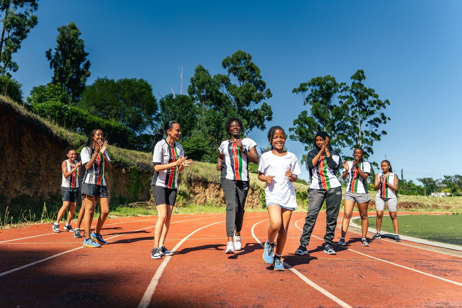 The Queen's Legacy: Catherine Ndereba, Kenyan Women, and the Enduring Spirit of Athletic Resilience  by  Enda Athletic Research Team